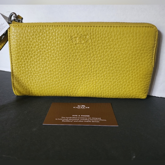 Coach Handbags - ‼️SOLD‼️✨️NWT✨️Coach Bleecker Pebbled Leather L-Zip Wallet Wristlet, Saffron